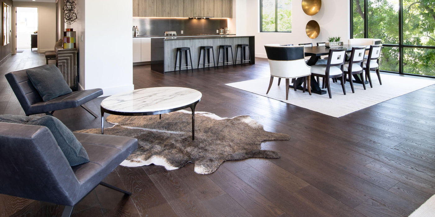 Open concept living area with beautiful hardwood flooring throughout