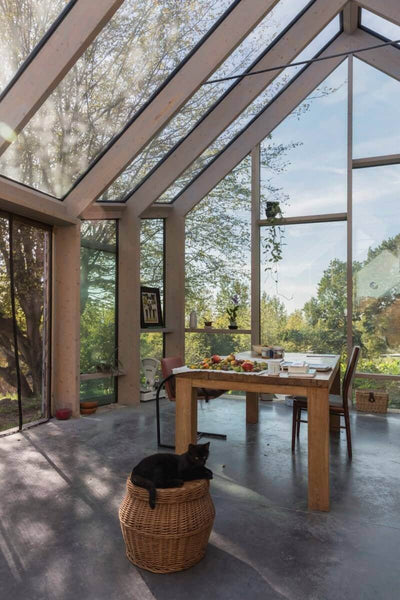 Wood beam sunroof with glass panels.