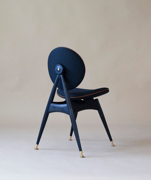 An ash dining chair finished with Rubio Monocoat Oil Plus 2C hardwax oil in the color Midnight Indigo.