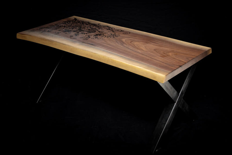 A live edge walnut coffee table finished with Oil Plus 2C in the color "Pure".