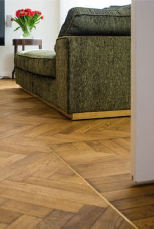 Details of wooden herringbone floors finished with Rubio Moncoat.