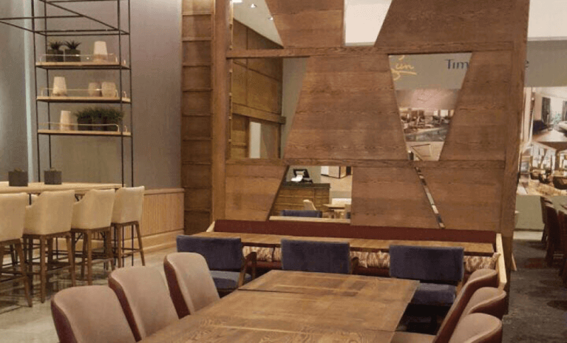 A unique wood diving wall with geometric cut-outs that is finished with Rubio Monocoat Oil Plus 2C wood finish.