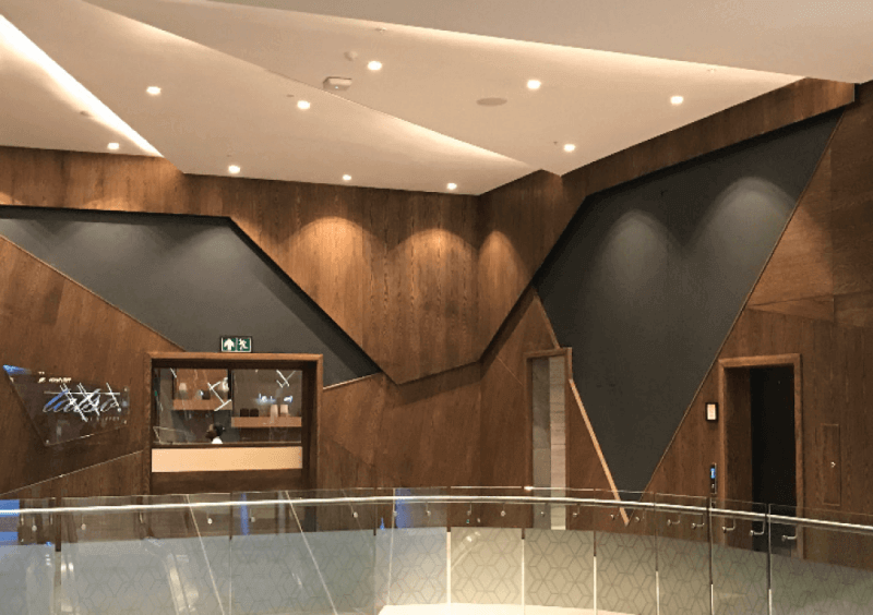 Creative wall art made from wood in a geometrical design.