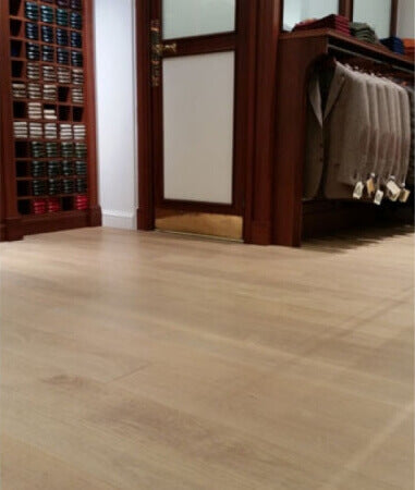 A natural colored hardwood floor.
