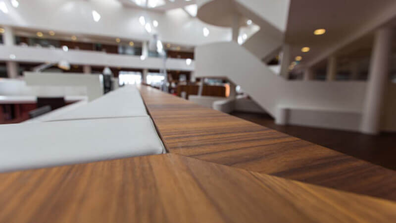 Details of the Walnut accent in a university study hall finished with hardwax oil.