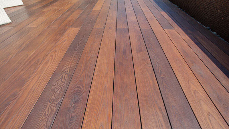 A wood deck finished with eco-friendly hardwax oil wood finish.