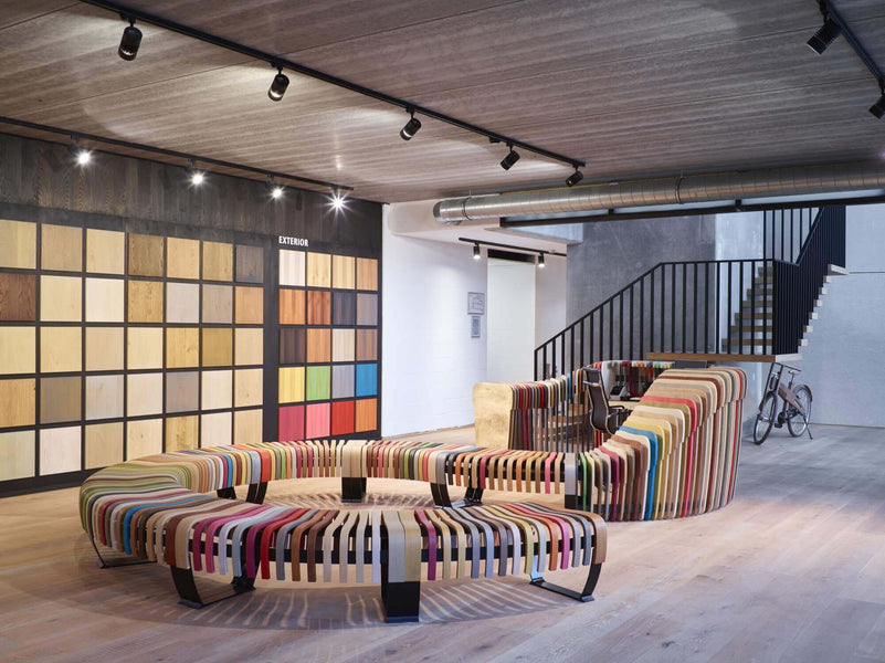 Rubio Monocoat colorful wood bench at headquarters in Belgium.
