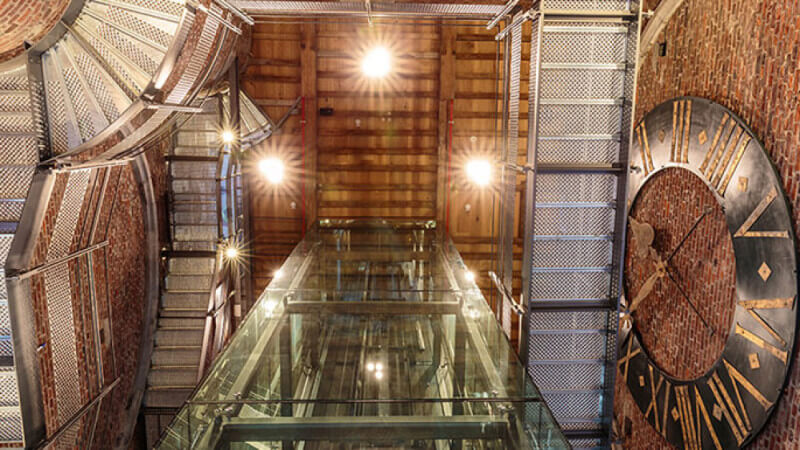 A view of the wooden ceiling inside a cathedral.