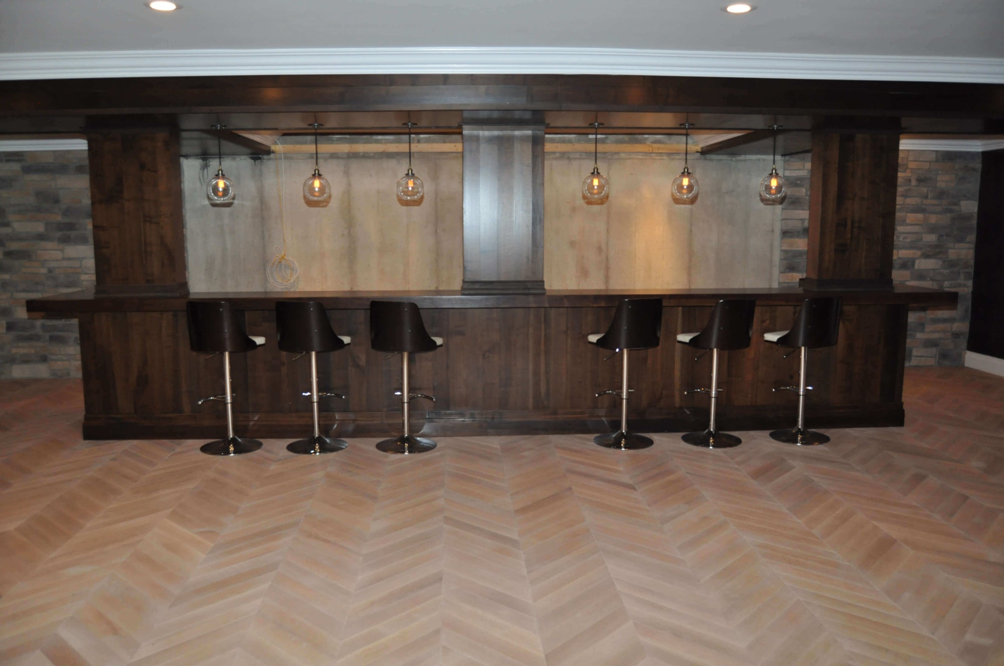 White oak chevron floor finished with Rubio Monocoat Oil Plus 2C.