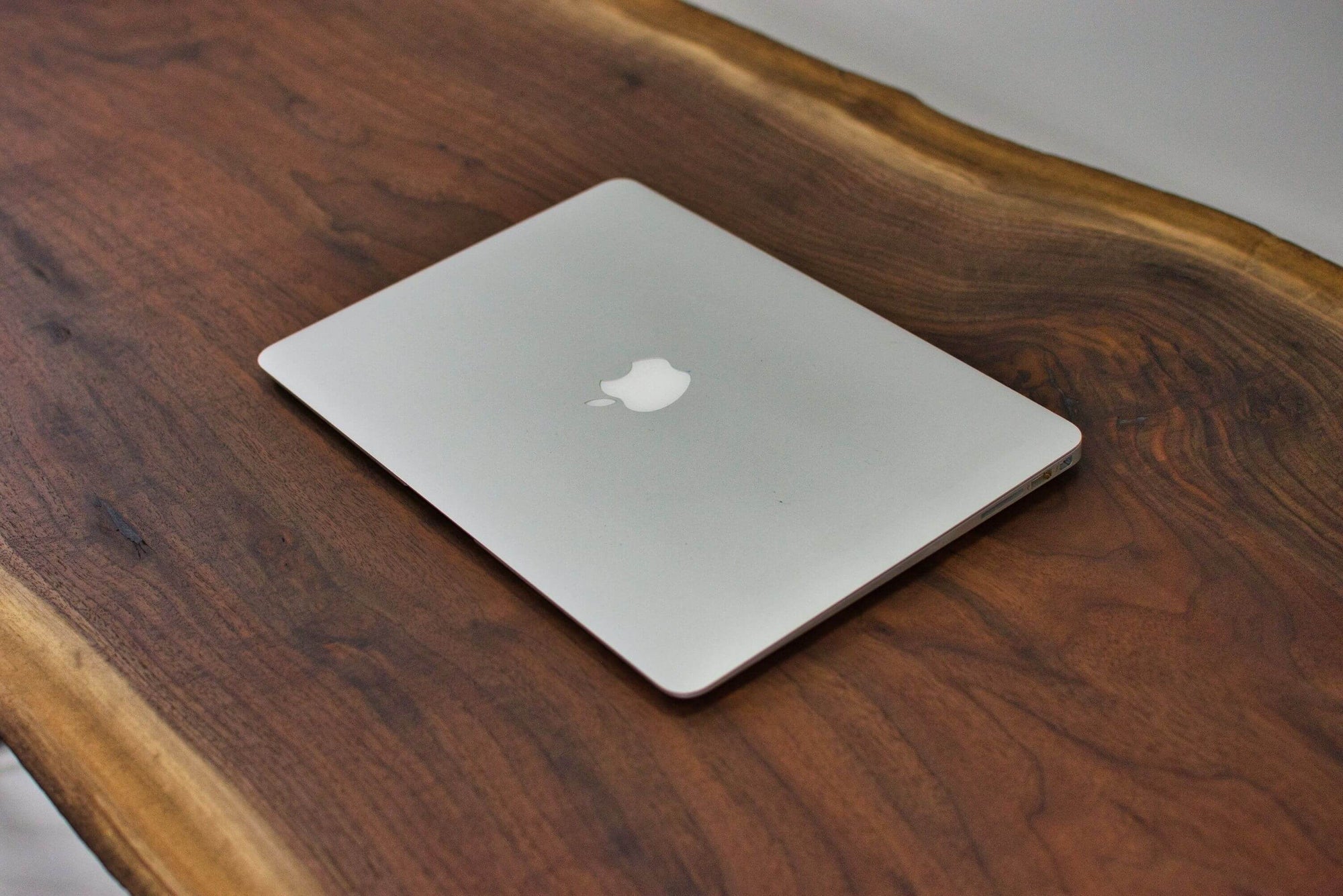 Close up of a beautiful walnut desk finished with Rubio Monocoat Oil Plus 2C.
