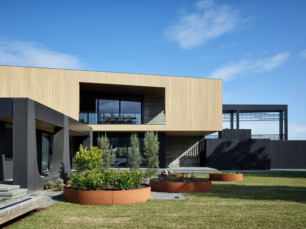 Exterior of an australian beach home with charred cypress finished with Rubio Monocoat hardwax oil finish.