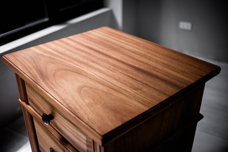 Natural wood surfaces with visible grain and a low-sheen finish