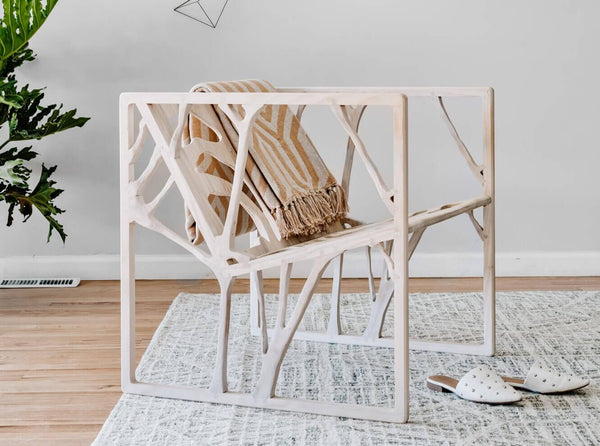 An organically crafted lounge chair names the Dispersion Chair. Crafted from ash and finished with Rubio Monocoat Precolor Easy and Oil Plus 2C.