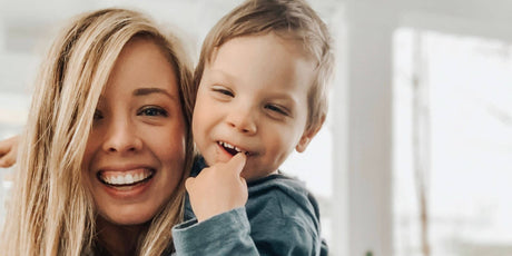 Faith Jablonski smiling with her son during her fight of cancer.