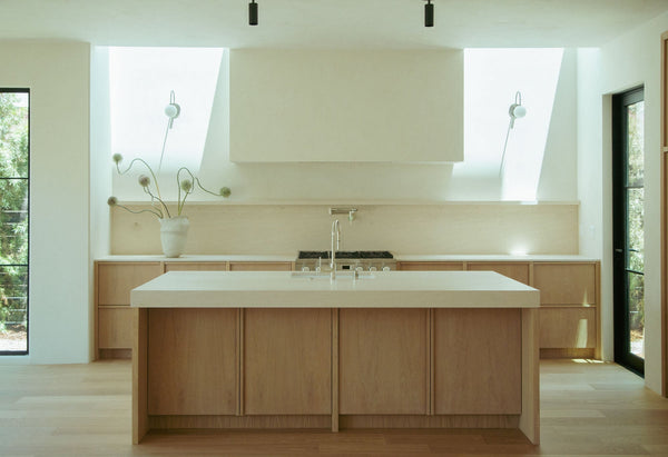 Project inspiration for a minimalist organic modern kitchen with white oak cabinetry finished with Rubio Monocoat Oil Plus 2C "Natural" hardwax oil wood stain and finish for interior wood projects.