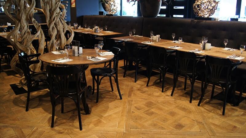 Wood flooring in restaurant finished with Rubio Monocoat Oil Plus 2C.