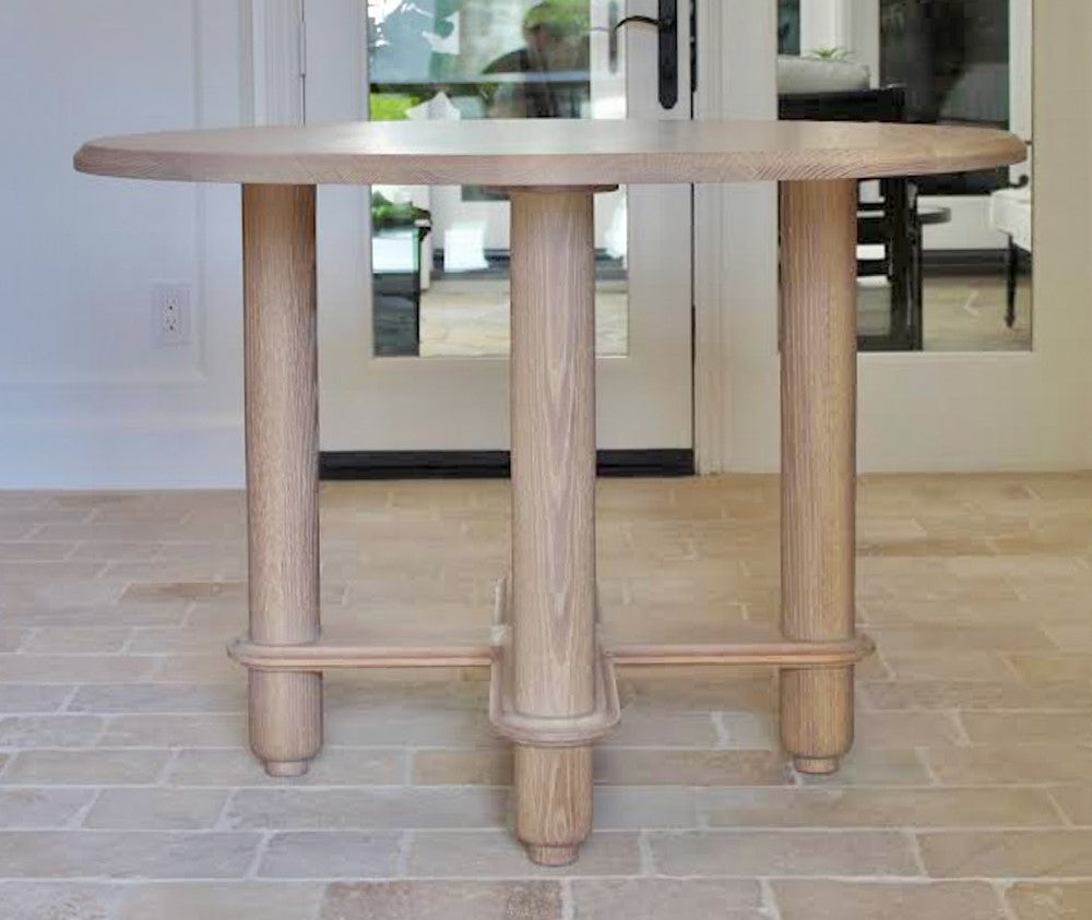 Round white oak entry table finished with Rubio Monocoat Oil Plus 2C in the color Vanilla.