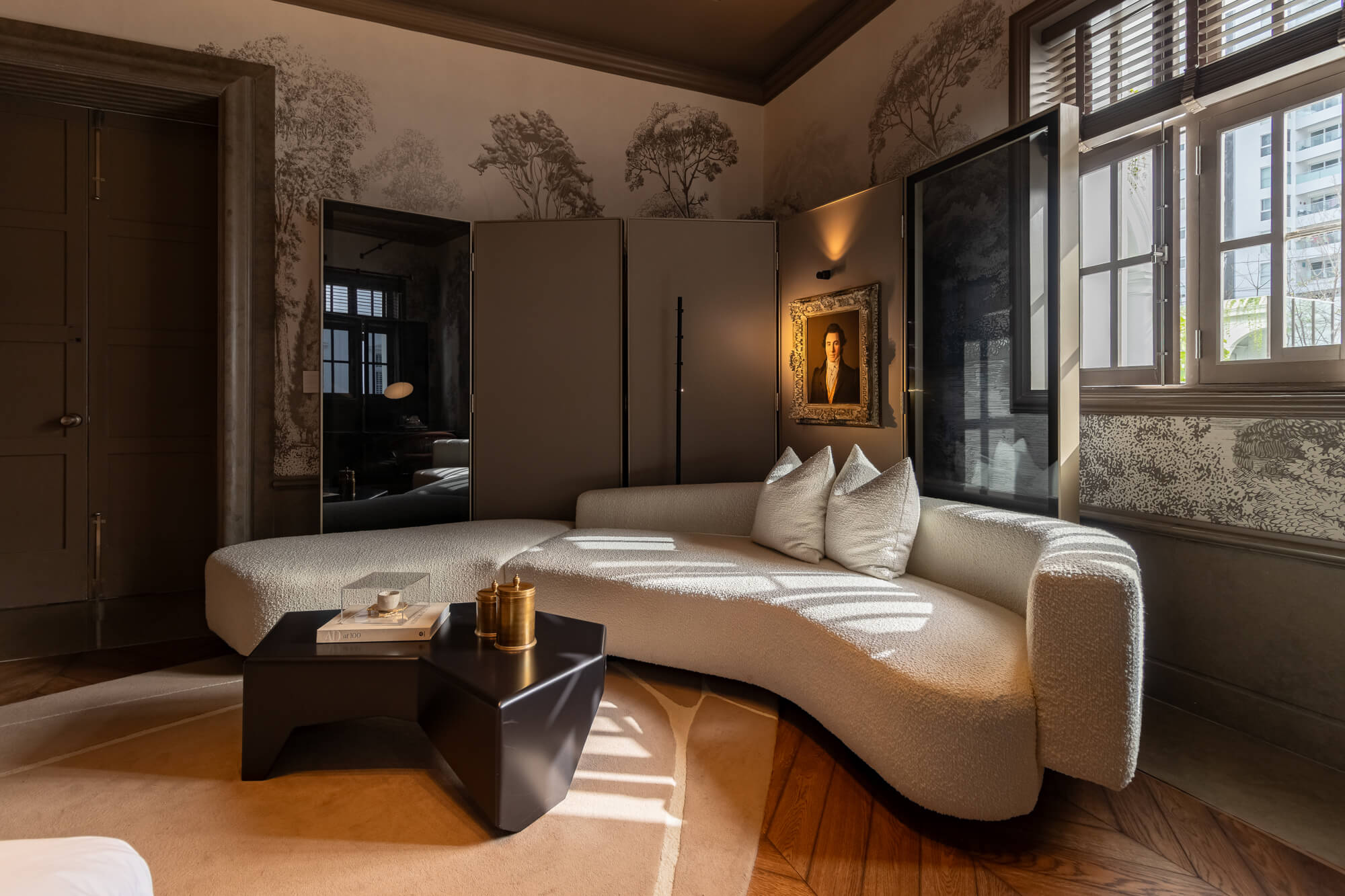 Project inspiration for a sophisticated, modern, and moody bedroom. The herringbone hardwood flooring was finished with Rubio Monocoat Oil Plus 2C single layer hardwax oil wood stain and finish for interior wood projects.