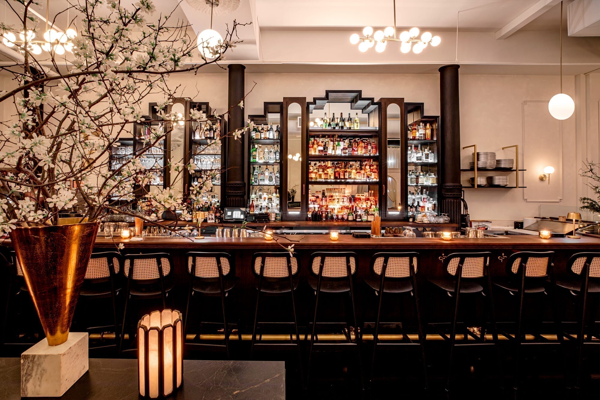 Project inspiration for a restaurant bar top made from walnut and finished with Rubio Monocoat Oil Plus 2C hardwax oil wood stain and finish for interior wood projects.