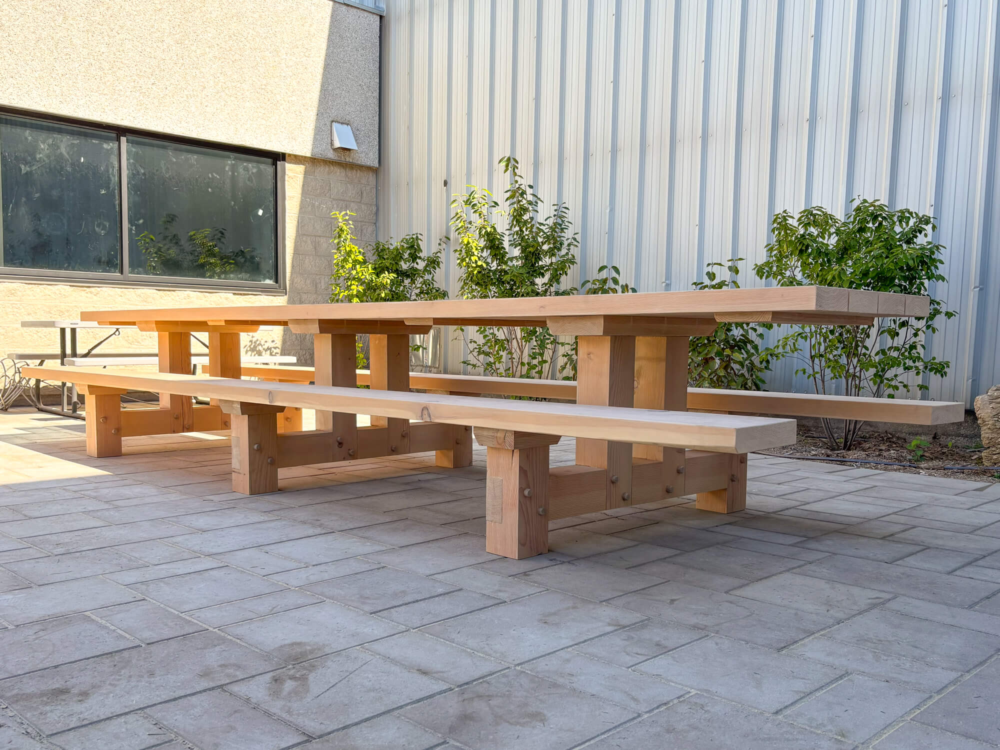 Outdoor furniture inspiration for a patio table finished with Rubio Monocoat DuroGrit, an exterior wood stain and finish for all outdoor wood projects.