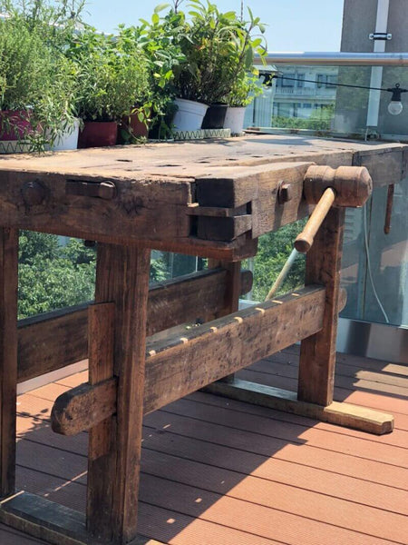 A workbench that was sanded and refinished with natural wood finish.