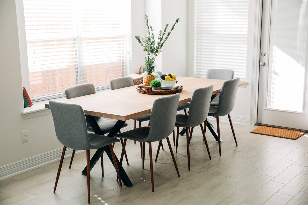 A dining table that seats eight made from white oak and finished with Rubio Monocoat Oil Plus 2C "White 5".
