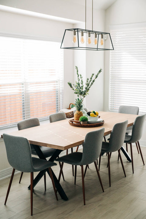 A contemporary white oak dining table finished using Rubio Monocoat Oil Plus 2C hardwax oil wood stain and finish for interior wood projects.