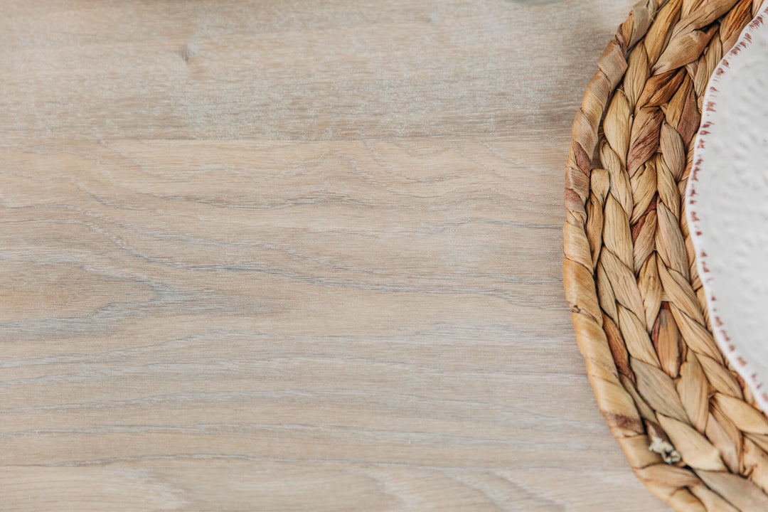 Close up of grain detail on a white oak table finished with Rubio Monocoat Oil Plus 2C Super White hardwax oil wood stain and finish in one.