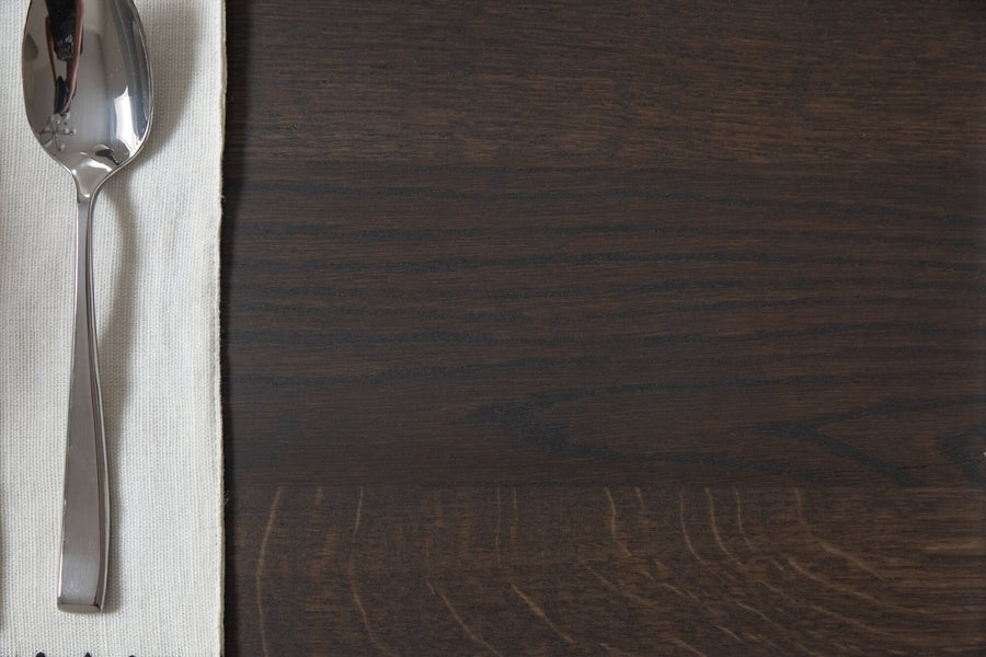 Close up of wood grain on a white oak table finished with Rubio Monocoat Oil Plus 2C "Charcoal".