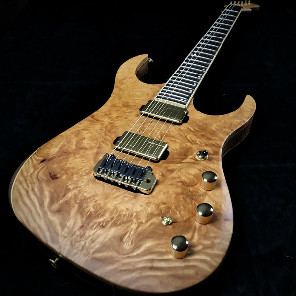 An overview shot of the body of the madrone burl guitar made my Meinzinger Guitars.