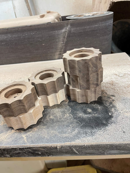 Unfinished walnut espresso machine parts.