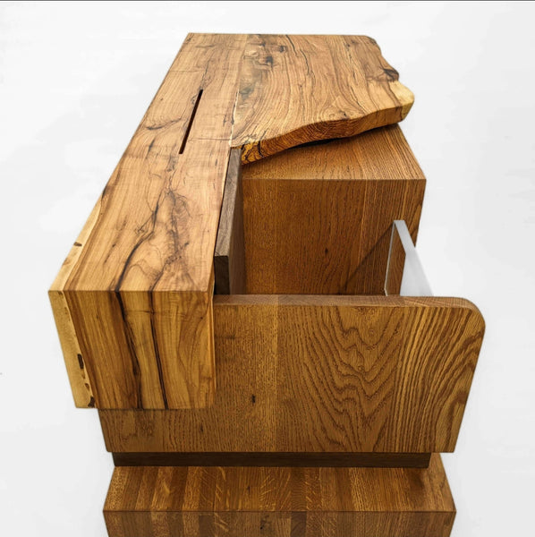 Side view of a live edge record storage console finished with a hardwax oil based finish.