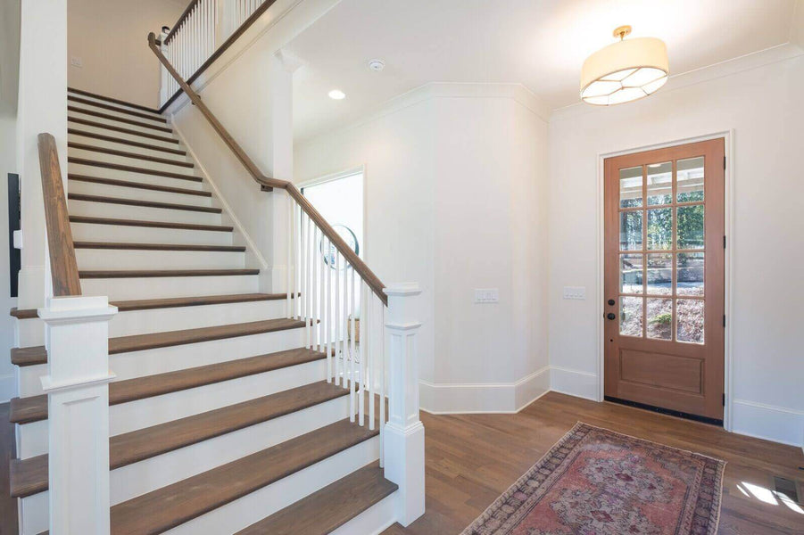 White oak hardwood stairs finished using an eco-friendly wood finish.