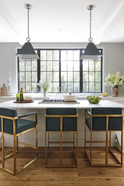 Kitchen with reclaimed wooden floors finished with Rubio Moncoat.