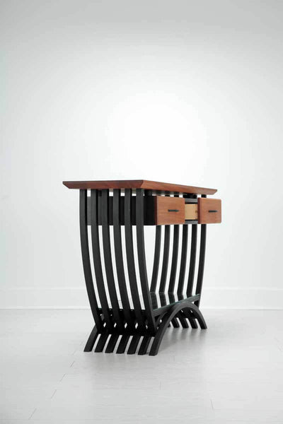 Side view of a curvy console table finished with Rubio Monocoat hardwax oil wood finish.