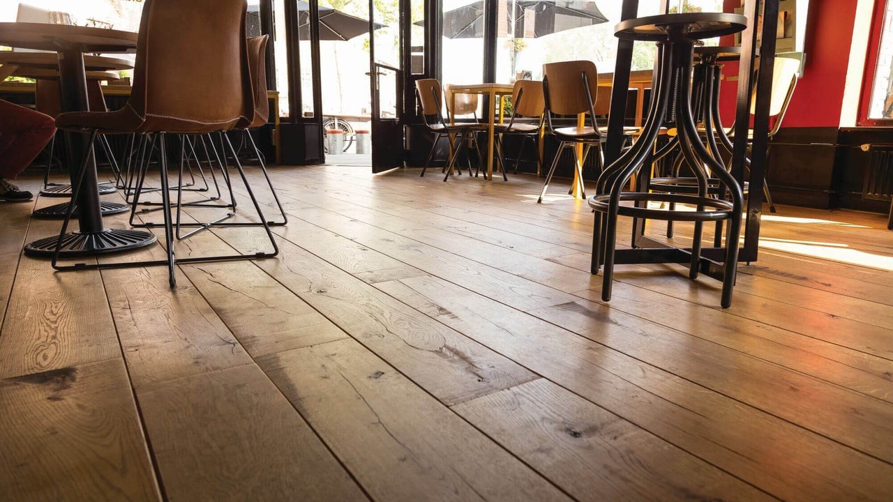 Hardwood flooring from aged oak in a store.