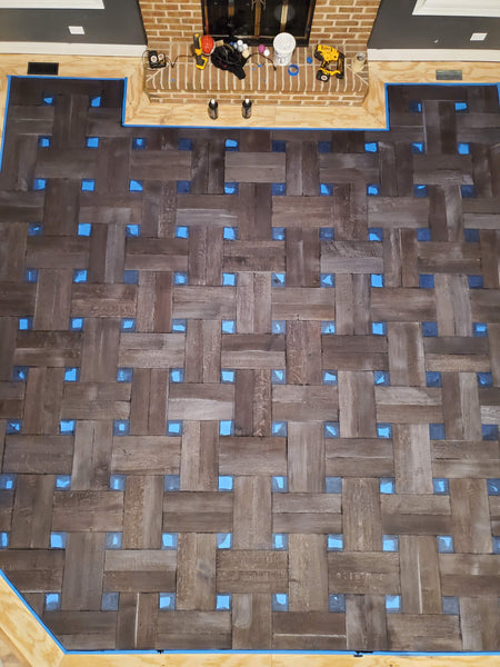 Basketweave hardwood floor treated with Rubio Monocoat Fumed Intense. 