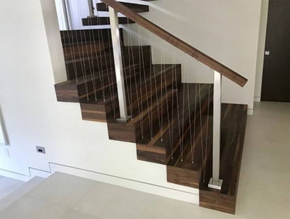 Walnut stair case finished with Rubio Monocoat.