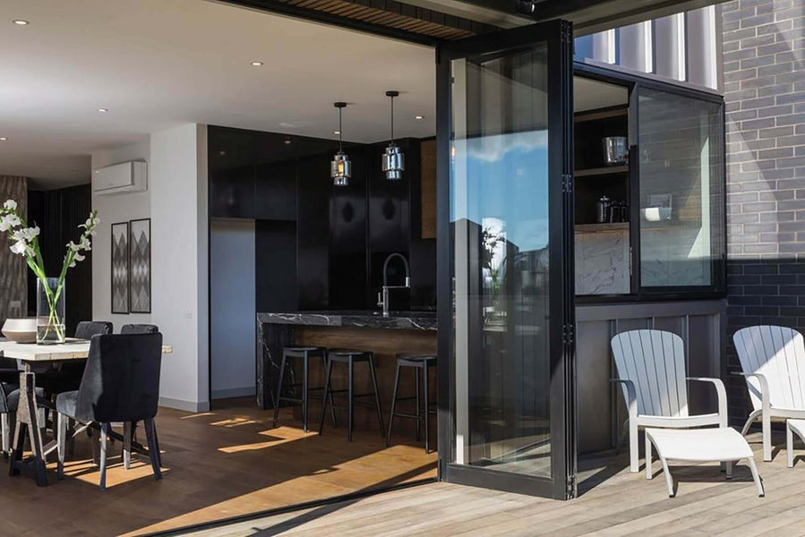 Large glass doors opening from kitchen and dining room to porch.