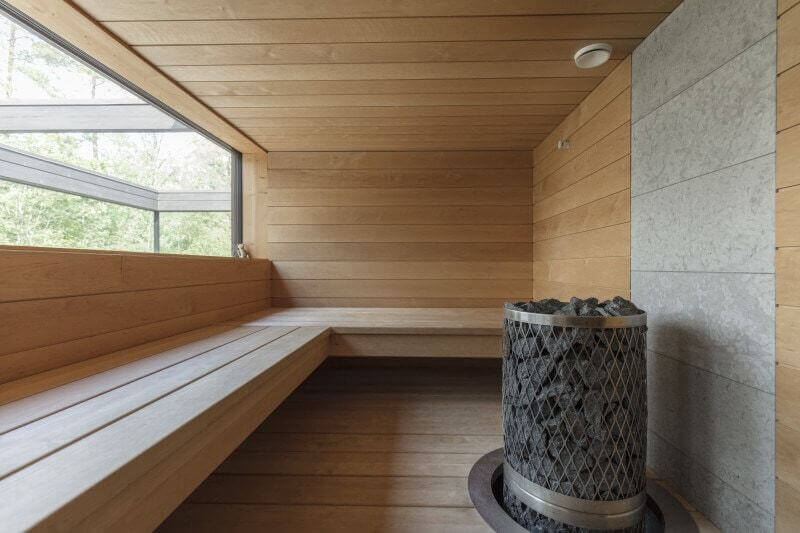 Wooden alcove with fire pit in private residence finished with Rubio Monocoat products.