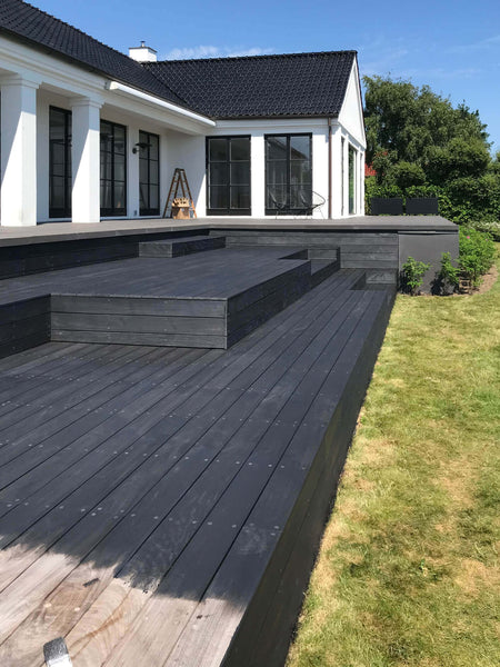 Ipe wood deck freshly sanded and recoated using an exterior deck finish.