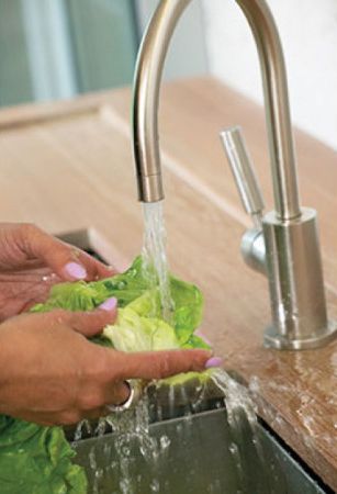 Water resistant wood finish by Rubio Monocoat protects wooden counter top.