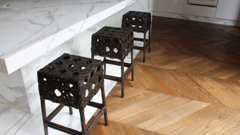 Close up of beautiful herringbone floor finished with Oil Plus 2C.