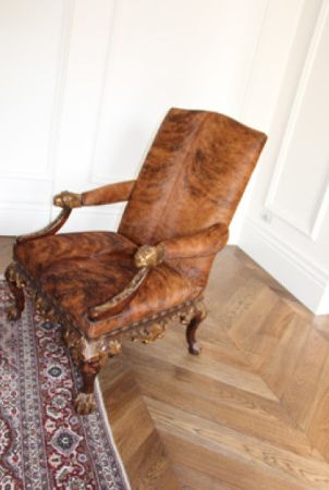 Antique chair on a beautiful herringbone floor finished with Rubio Monocoat.