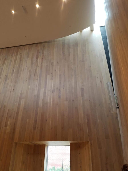 University of Oregon concert hall has white oak walls curved out to direct sound upwards.