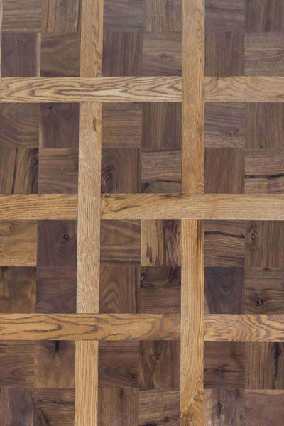 Detailed look at a white oak and walnut parquet floor finished with Rubio Monocoat.