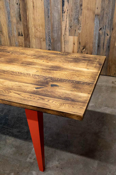 A white oak dining table that was charred and finished with Rubio Monocoat Oil Plus 2C "Pure".