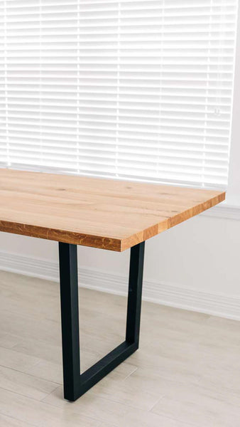A white oak table with a modern look finished with Rubio Monocoat Oil Plus 2C hardwax oil wood stain and finish.