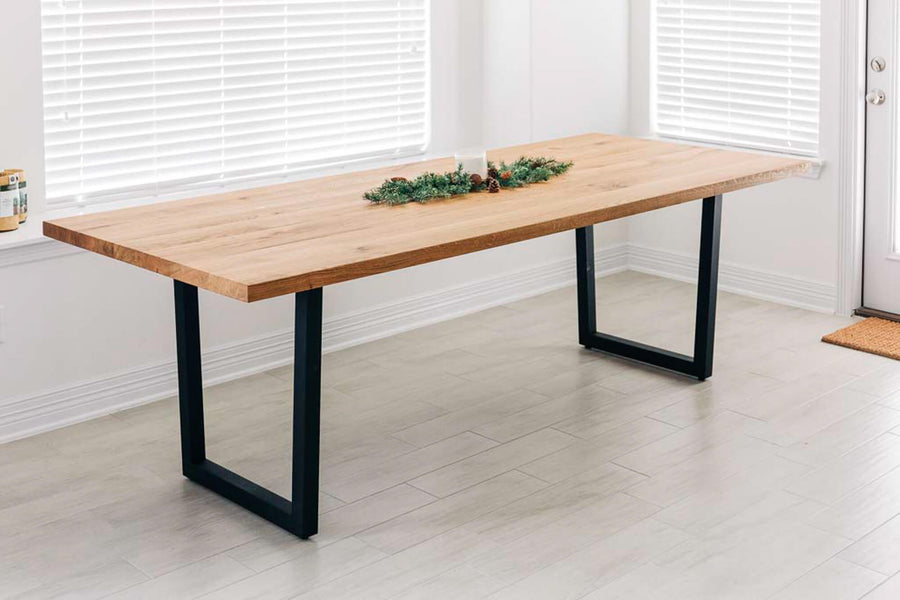 A solid white oak dining table finished with Rubio Monocoat Oil Plus 2C hardwax oil wood stain and finish for interior wood projects.