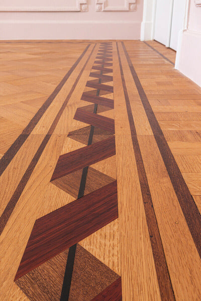Hardwood floor border inlay.